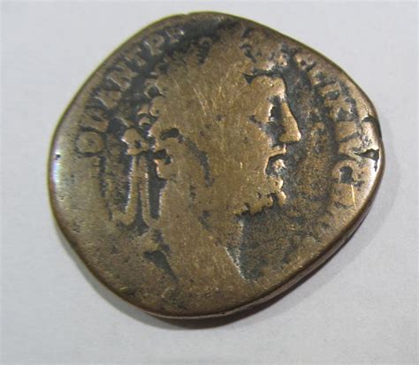 Identification Monnaies Romaines