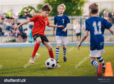 Young Boys Playing Soccer Game Training Stock Photo 1607127826 ...