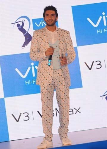 7 Celebrities Who Wore Sneakers With Suits The Right Way