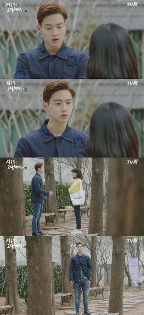 an image of a man standing in the middle of some trees and talking to ...