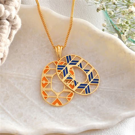 Zulu Dakarai Dual Enameled Pendant – VOYLLA