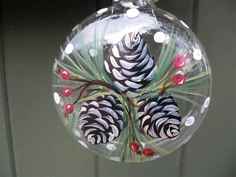 Hand painted glass ornament with berries and pinecones image 0 ...