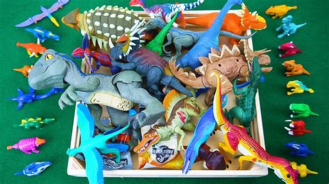 哇！好多恐龙玩具，小朋友们认识它们都是什么恐龙吗？_腾讯视频