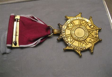 Medal Legion of Merit Award with ribbon bar and lapel pin in case ...