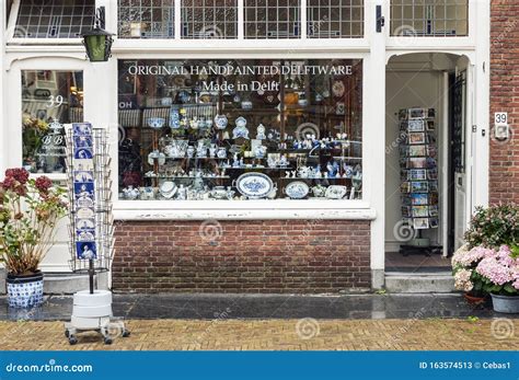 Window Display of Traditional Delftware Pottery Shop in Delft Editorial ...