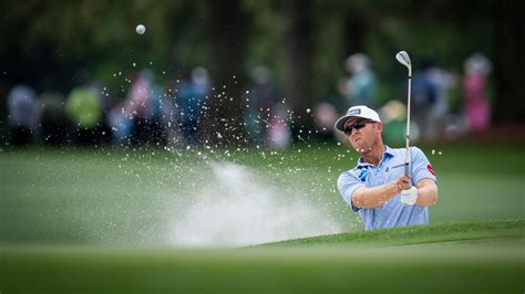 Seamus Power of Ireland plays a stroke from a bunker on the No. 17 hole ...
