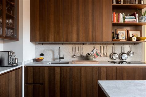 Walnut kitchen cabinets and an eclectic Scandinavian interior design ...