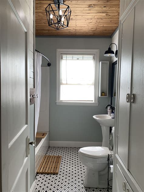 Small Farmhouse Bathroom with Hexagon Tile and Wood Plank Ceilings