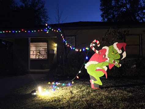 The Grinch is stealing my christmas lights!!! | Grinch christmas lights ...