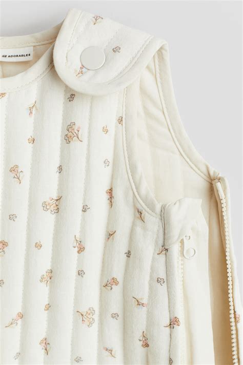 Patterned sleep bag - Light beige/Floral - Kids | H&M IN