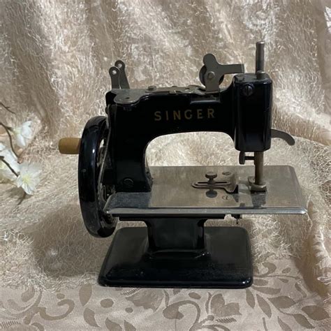 Image result for Singer Mini Sewing Machine