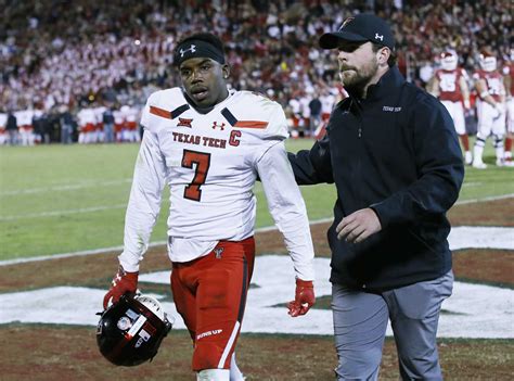 NCAA FOOTBALL: Targeting calls set record, AP finds Pac-12, SEC had most