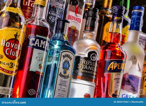 Bottles of Assorted Global Hard Liquor Brands in a Bar Editorial ...