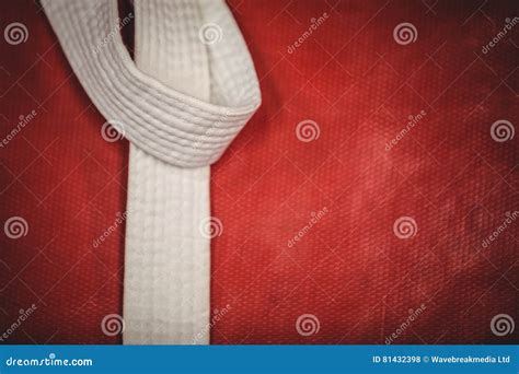 Karate White Belt on Red Background Stock Photo - Image of lifestyle ...