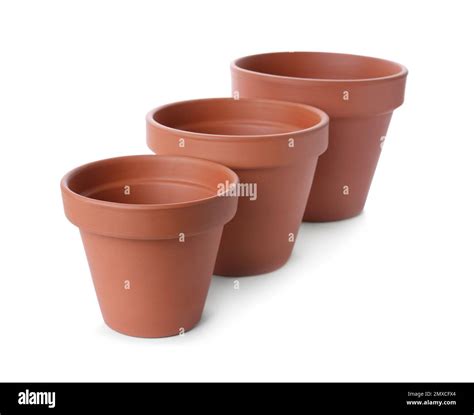 Stylish terracotta flower pots isolated on white Stock Photo - Alamy