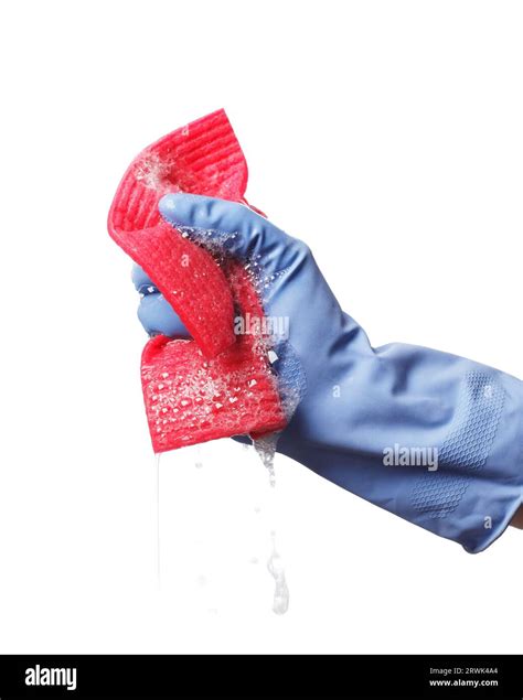Hand holding a soapy synthetic cleaning cloth Stock Photo - Alamy