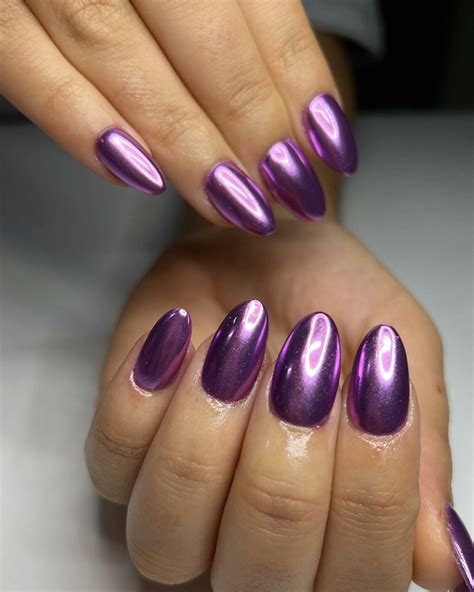 https://www.naildesignsdaily.com/wp-content/uploads/2023/06/chrome-purple-nails-28-1229x1536.jpg