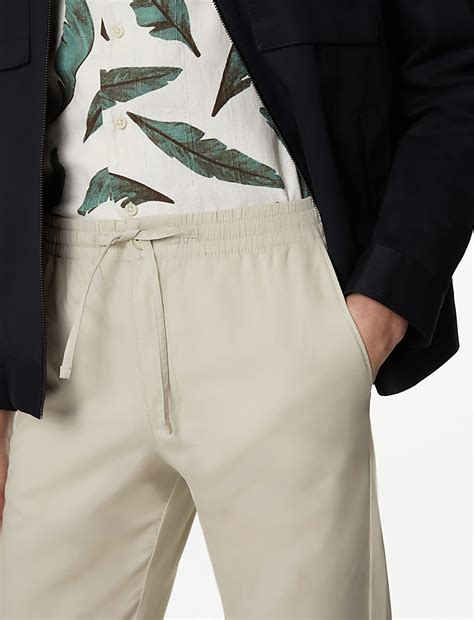 Buy Tapered Fit Elasticated Waist Trousers at Marks & Spencer