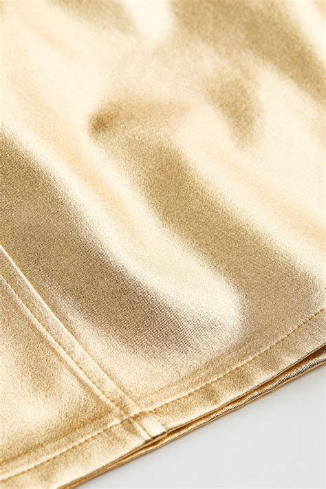 Twill mini skirt - Gold-coloured - Ladies | H&M IN