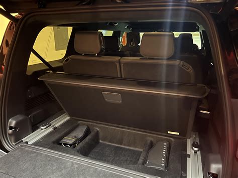 R1S Cargo Cover Holds The Load Floor Panel! : r/Rivian