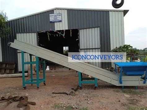 Industrial Conveyor System - Inclined Cleated Belt Conveyor ...