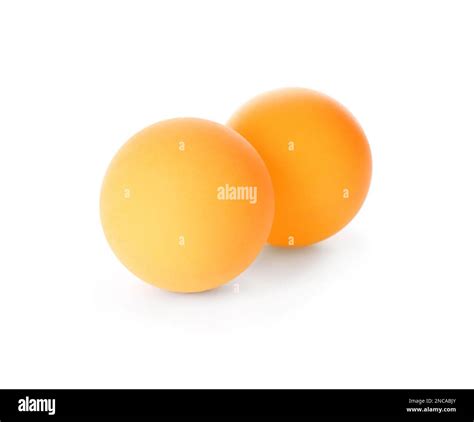 Orange ping pong balls isolated on white Stock Photo - Alamy