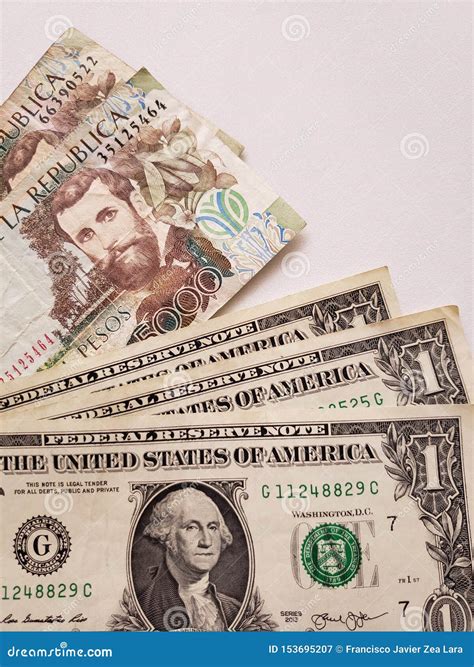 American One Dollar Bills and Colombian Banknotes of 5000 Pesos Stock ...