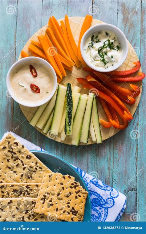A Bowl of Fresh Vegetables and Dips. a Healthy Concept Stock Photo ...