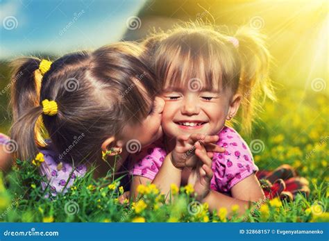 Two Sisters Kissing And Hugging Stock Photo | CartoonDealer.com #38970450