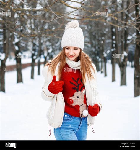 Lovely Girl With A Stylish Retro Sweater, A White Winter Jacket And ...