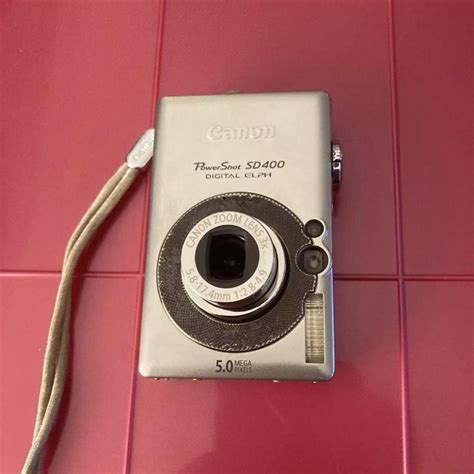 Canon PowerShot ELPH SD400-SILVER-5.0 MP-ULTRA... - Depop