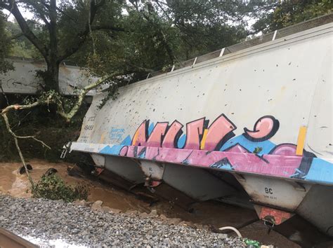Hurricane Delta leaves two dead and train DERAILS in torrential rail as ...