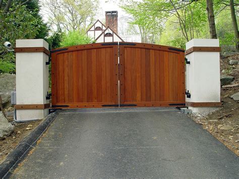 A unique example of a vintage-inspired wooden driveway gate. Solid ...