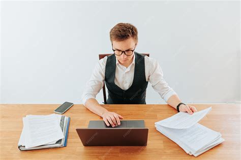 Premium Photo | A whitecollar office worker in his home office wearing glasses and a dress shirt ...