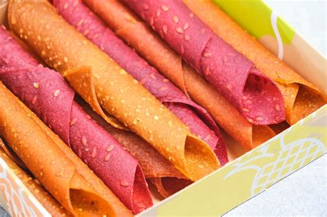 Fruit and berry pastille dessert with nuts and seeds in a box | Premium ...