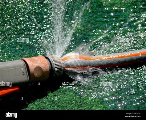 Hose splashing hi-res stock photography and images - Alamy