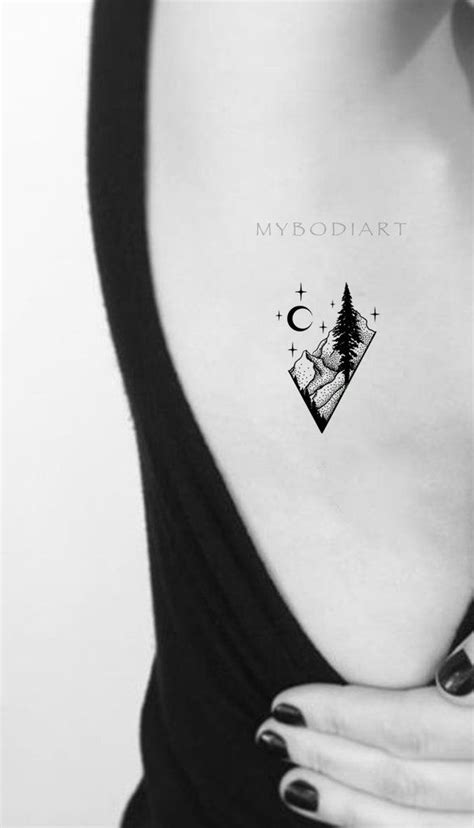 Cool Black Nature Rib Tattoo Ideas for Women Diamond Mountain Tree Moon ...