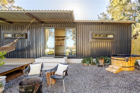 A Shipping Container with Firewood Hot Tub - Shipping containers for ...