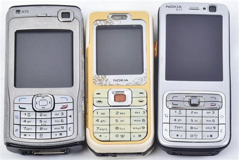 Nokia N70, N73 and 7360 - three vintage early 2000s handheld mobile ...