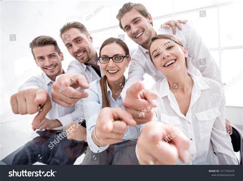 Group of People Standing in Office Pointing 的图像结果