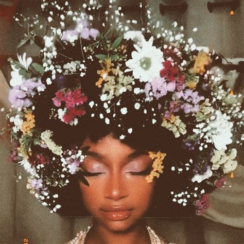 floral woc | Flower photoshoot, Flowers in hair, Natural hair styles