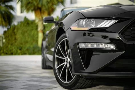 Rent Ford Mustang Black in Dubai - Convertible - Octane.Rent