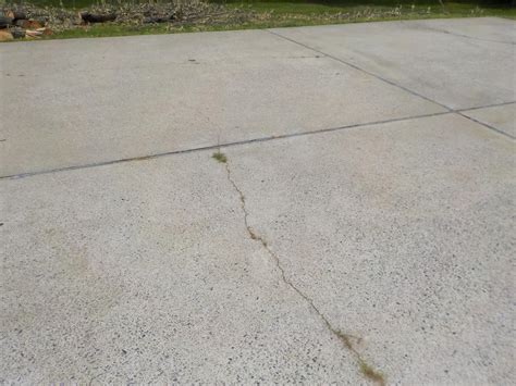 Concrete Leveling - Concrete Driveway Lifted in Paducah, KY - Cracks in ...