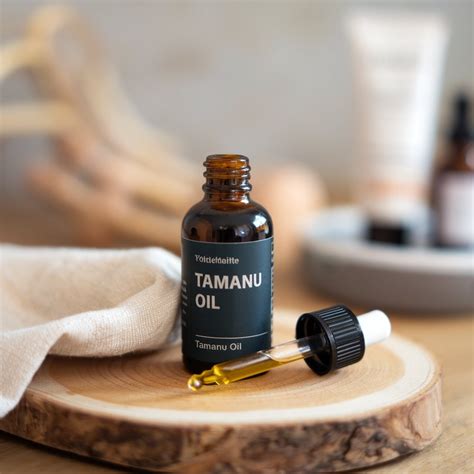 https://greenglowguide.com/wp-content/uploads/2024/08/A-photo-of-a-bottle-of-tamanu-oil-with-a-dropper.jpeg?utm_source=chatgpt.com