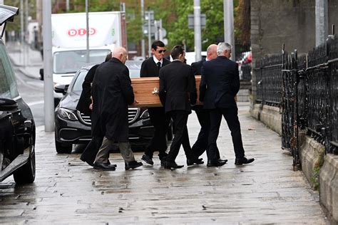 Godfather theme played as remains of Tony Felloni taken from church ...