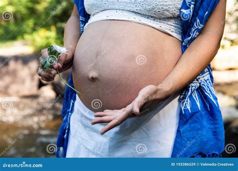 Pregnant Woman Posing in the Woodlands Stock Image - Image of portrait, round: 193386529