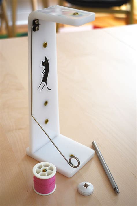 Image result for How to Wind Embroidery Thread On Replacement Spool