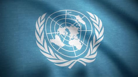United Nations flag. The United Nations flag waving in the wind. International flag of UN ...