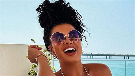 Joy Taylor almost spills out of barely-there bikini as Fox host's fans gasp 'you’re the bar and ...