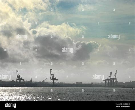 Silhouette of Red Hook container terminal and waterfront with dramatic ...
